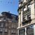 Architecture Reims: top of two buildings against a clear blue sky